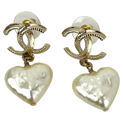 vintage chanel heart drop pearl earrings|Vintage Chanel diamond earrings.